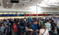 奥克兰机场大排长队值机延误，全球性问题所有航空公司都受影响