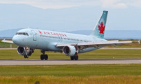 加拿大客机紧贴4架待飞航班降落 险些酿成史上最严重空难