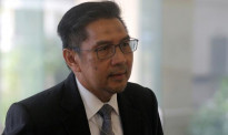 马来西亚民航局长辞职 称为MH370失踪事件负责