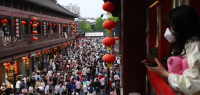 中国“五一”假期出游热度初显 机票涨价50%